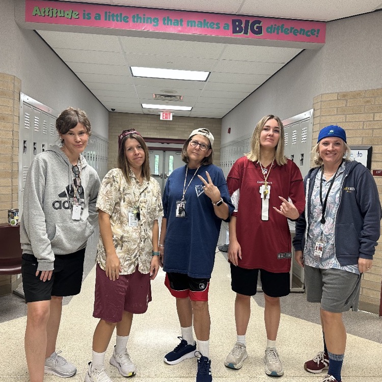 five teachers dressed as Adam Sandler