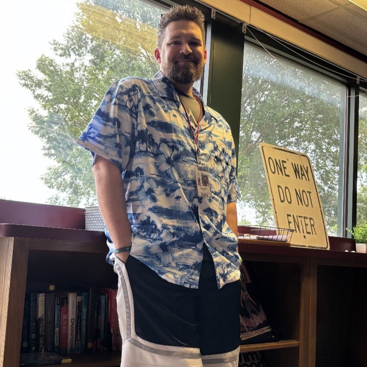 staff member dressed as Adam Sandler