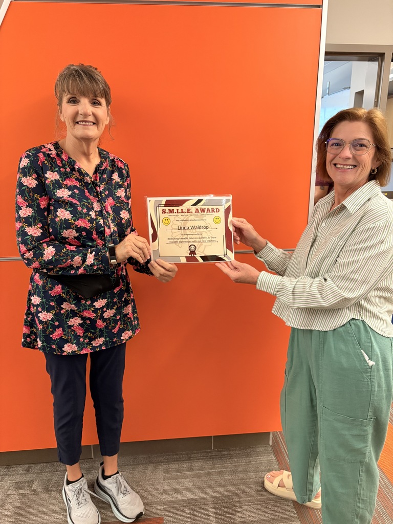 Mrs. Waldrop being presented with her S.M.I.L.E.