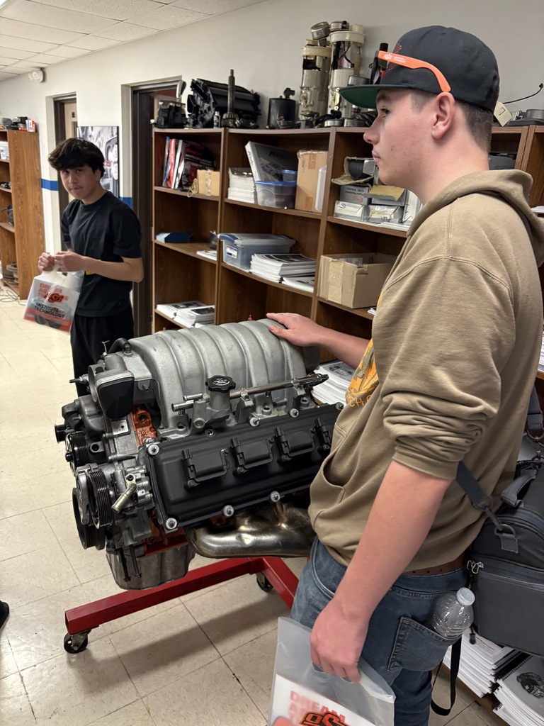 a student with an engine