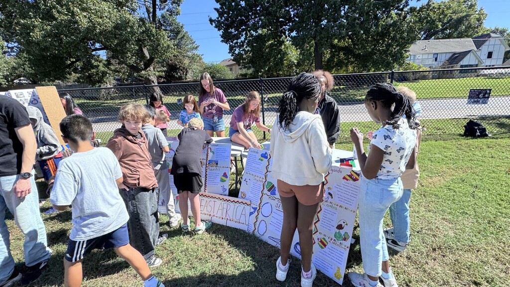 Global village students with booths at JEI
