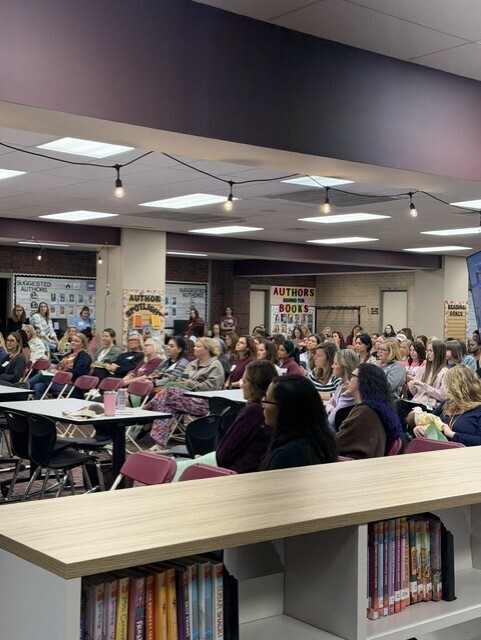Marvelous moms guests gathering in the library