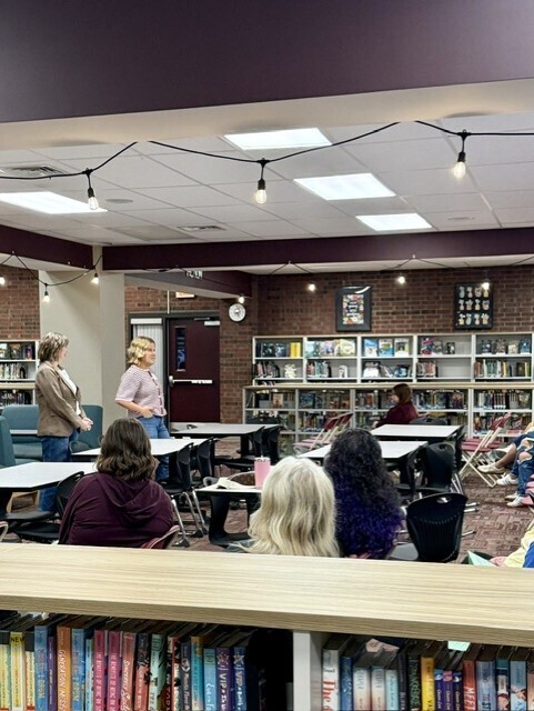 Marvelous moms guests gathering in the library