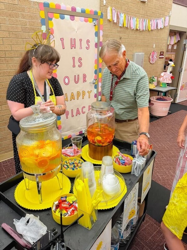 Staff members enjoying the Sunshine station and fixing their beverages