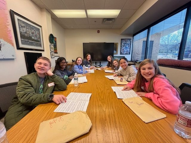 students at circle the state