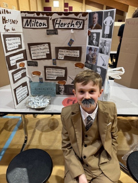4th grader dressed up as Milton Hershey