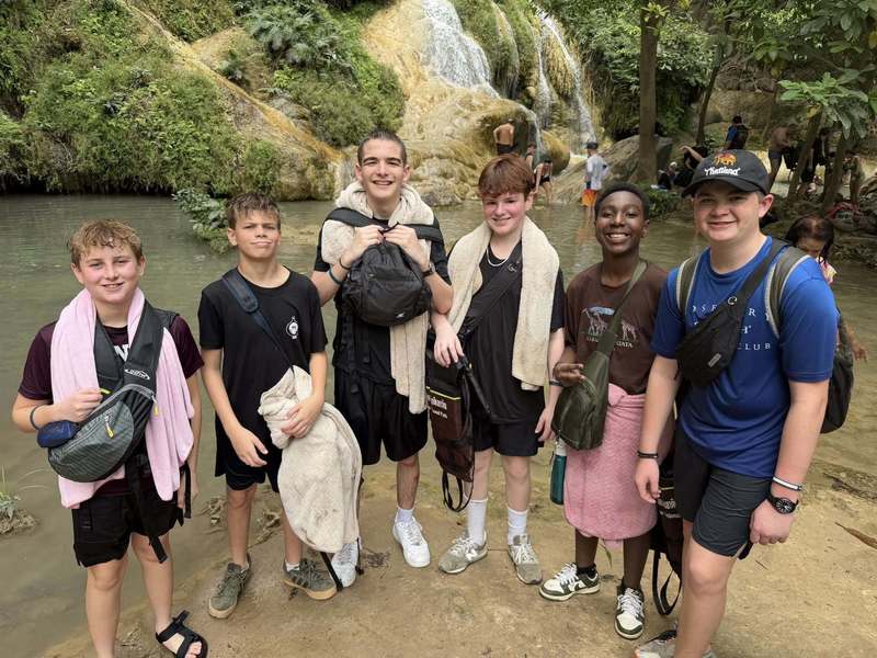 Thailand waterfall with students