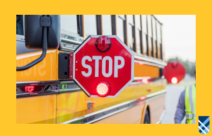 School bus with stop arm out