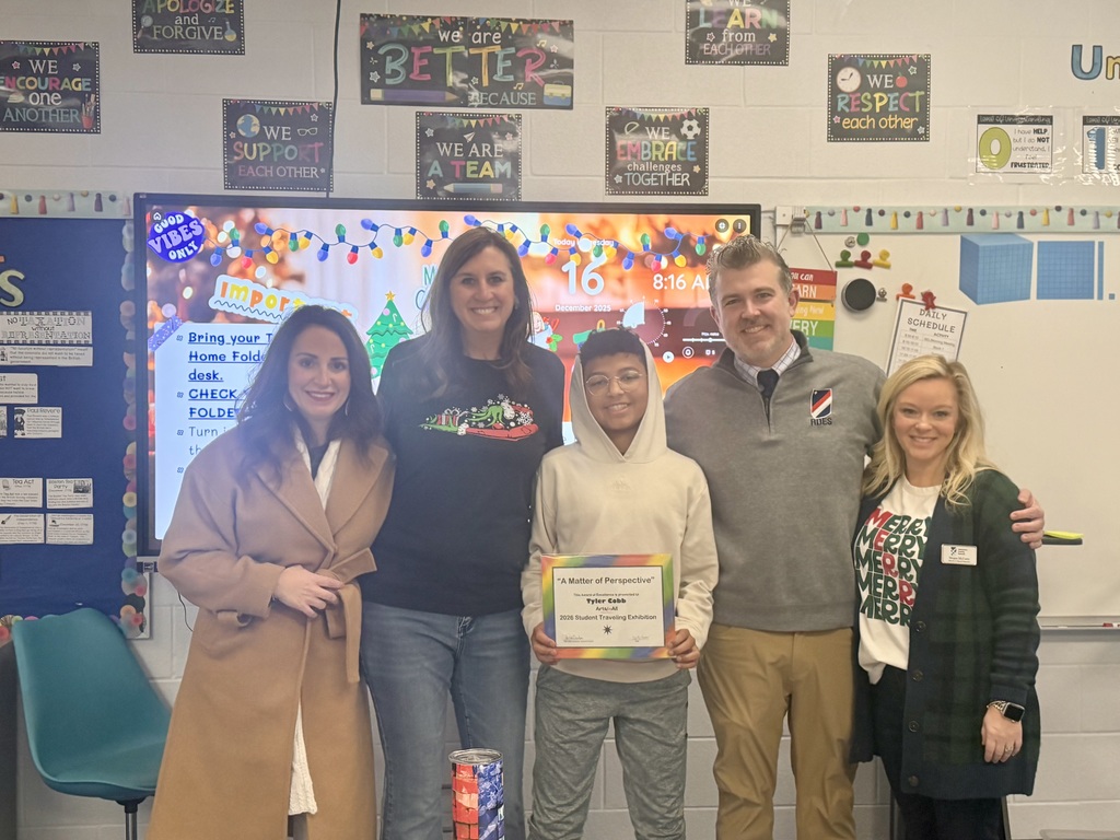 This picture includes the student winner, the school principal, the Director of Special Education and Assistant Director and special education teacher.