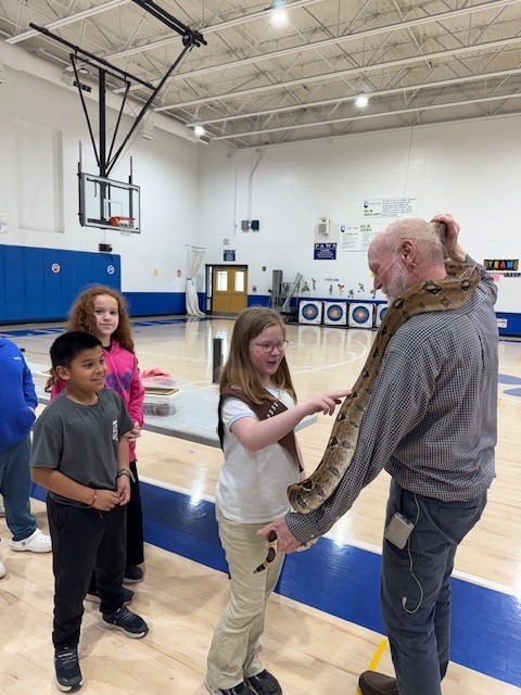 WAR students with snake