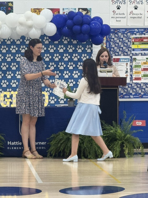 student receiving certificate