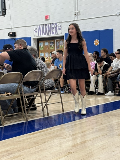 student walking to seat