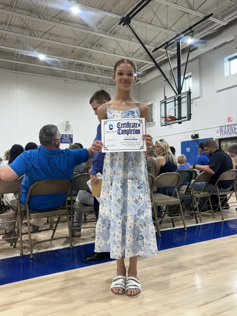 student with certificate