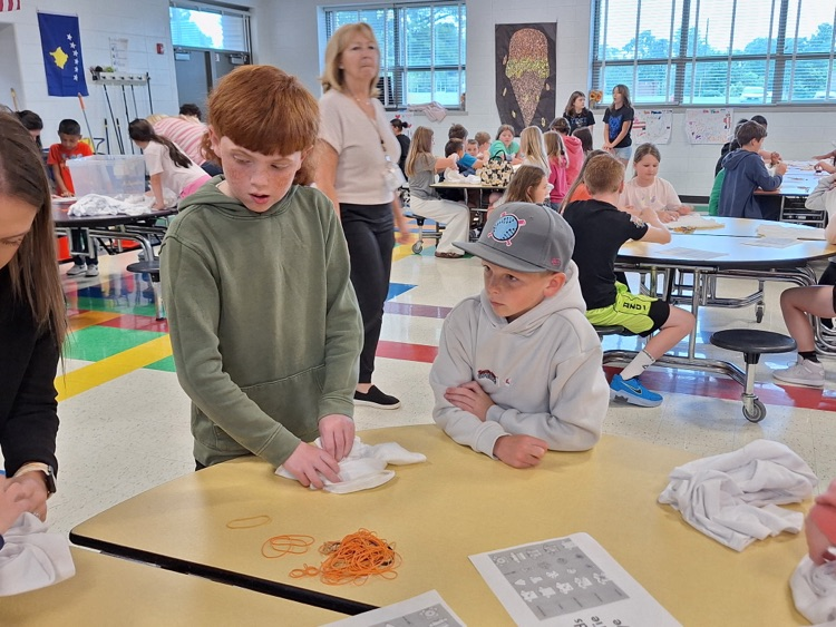 Our 5th graders helped 2nd grade with their tie-dye shirts. We can't wait to see how their designs turn out! 💫🥳