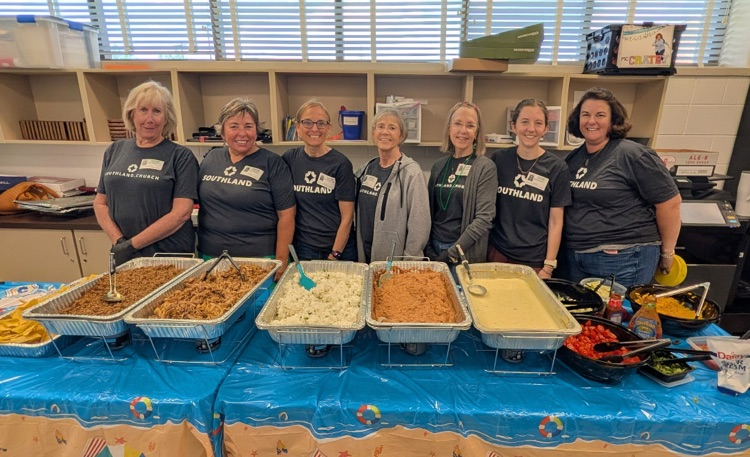 volunteers with food