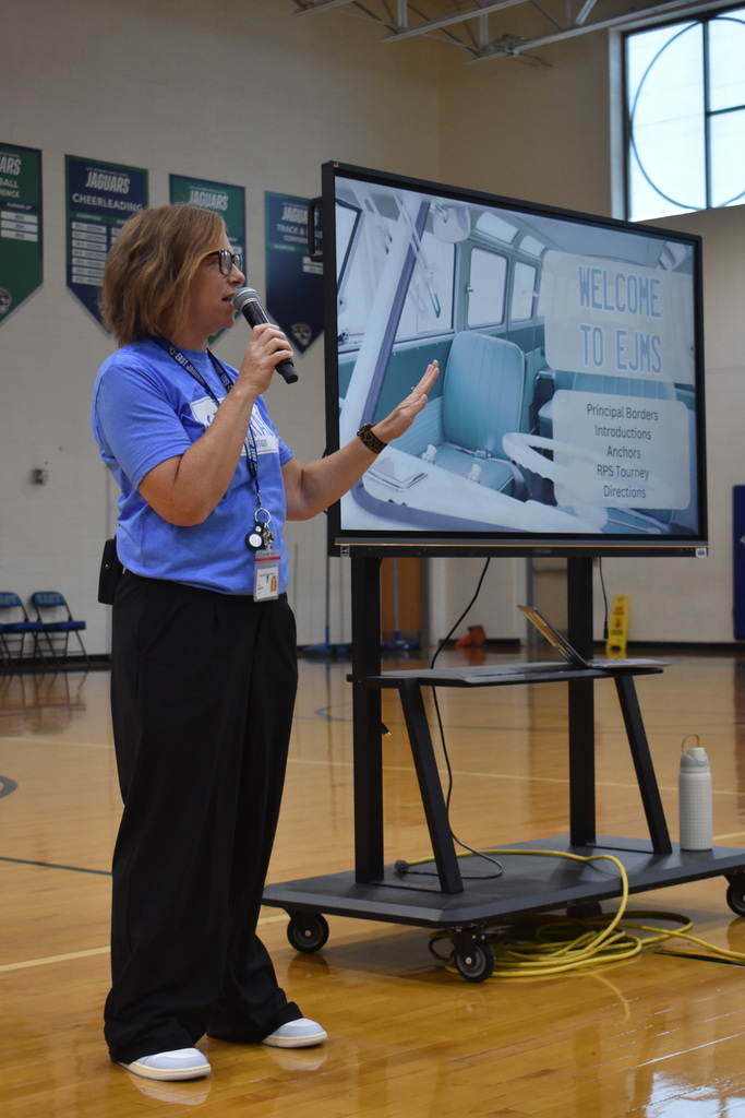 Principal Borders greeting new 6th grade students to EJMS.