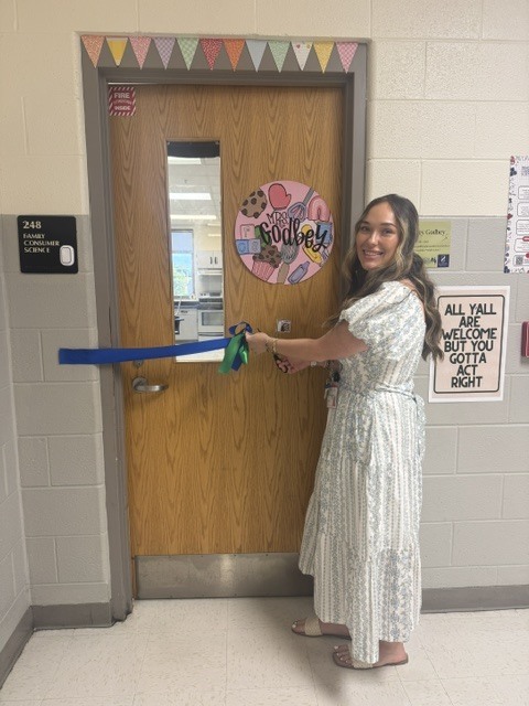 Mrs. Godbey's ribbon cutting ceremony.