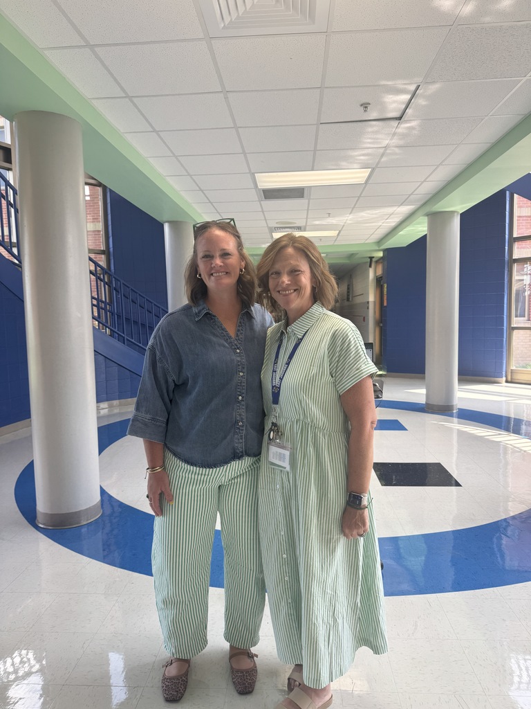 Principal Borders and Mrs. Blackmore bringing smiles to the halls for the first day of school.