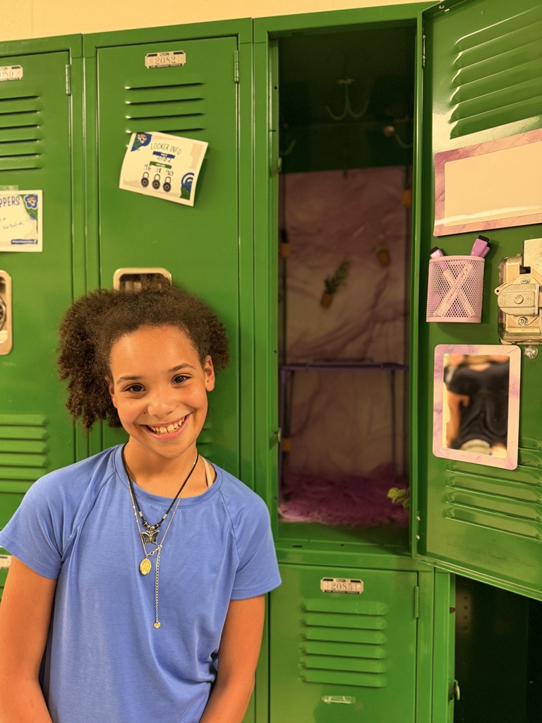 6th grade students and families setting up student lockers for the school year.
