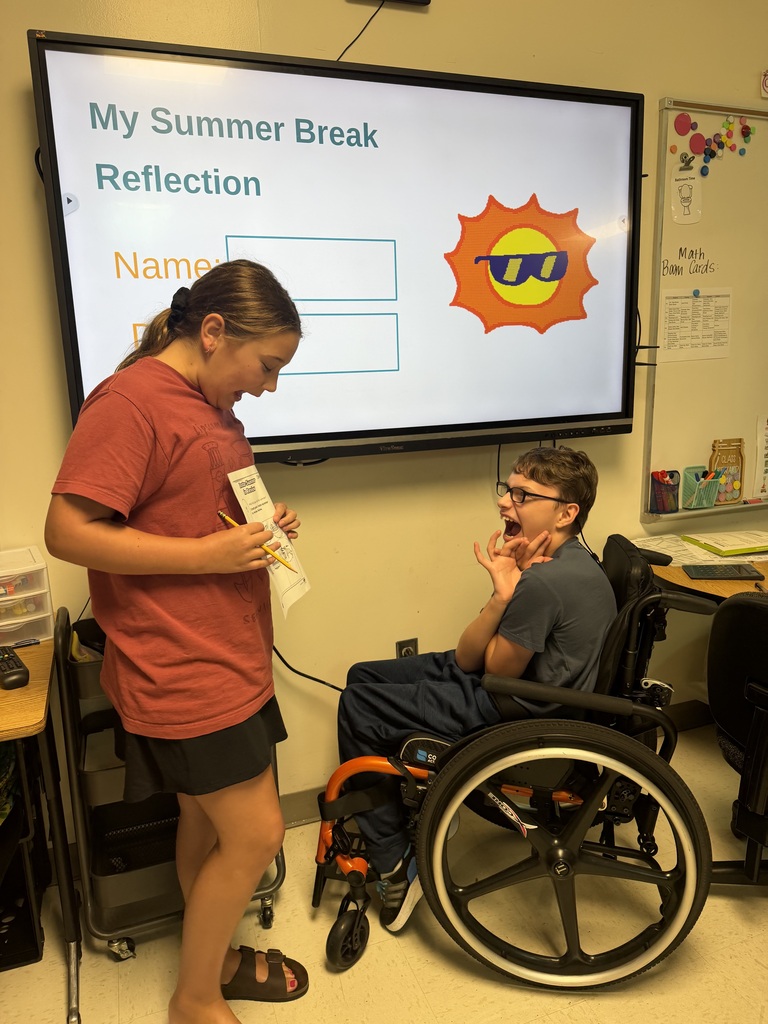 Mrs. Martin and her students demonstrating strong communication for their graduate profile.