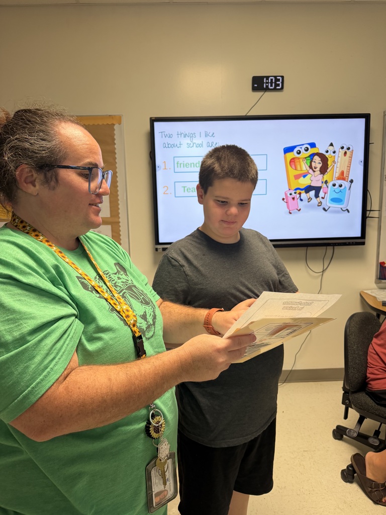 Mrs. Martin and her students demonstrating strong communication for their graduate profile.