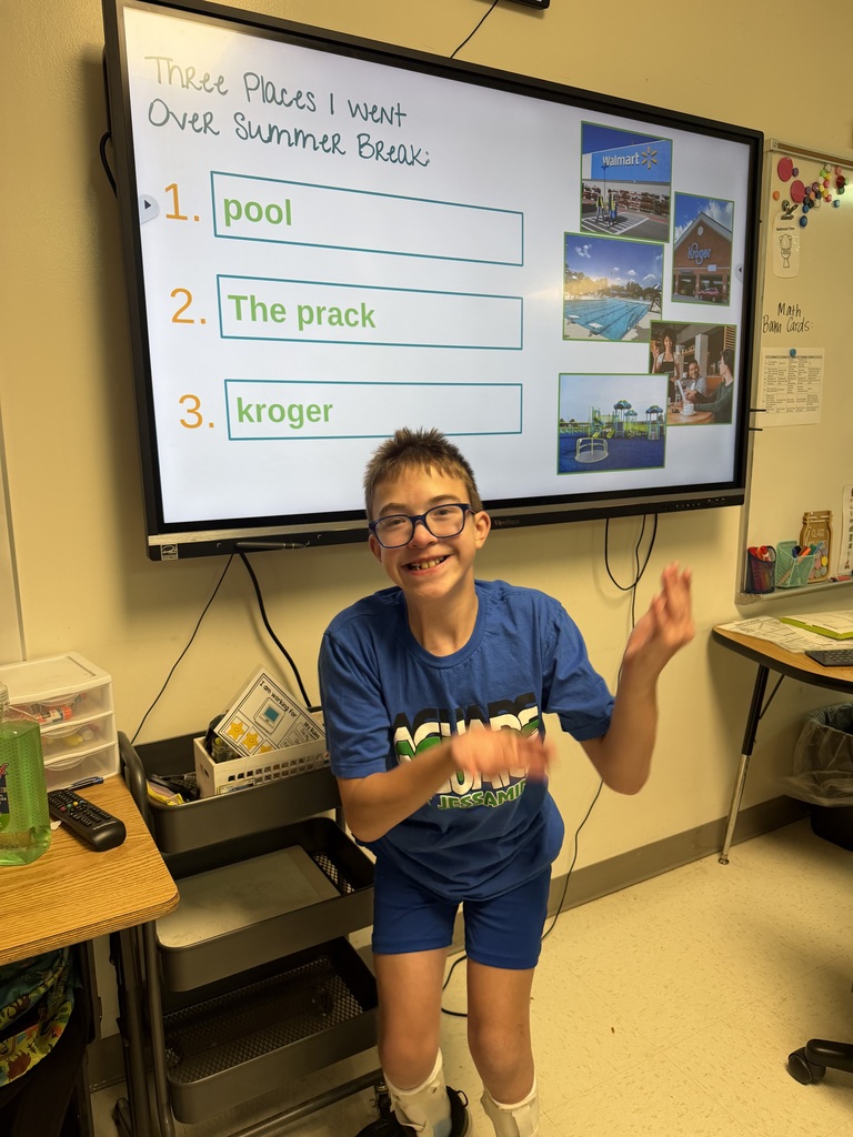 Mrs. Martin and her students demonstrating strong communication for their graduate profile.