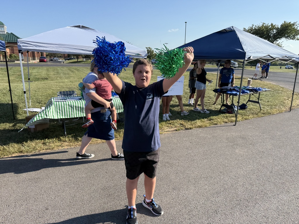 Ashton doing his best to recruit students interested in cheer.