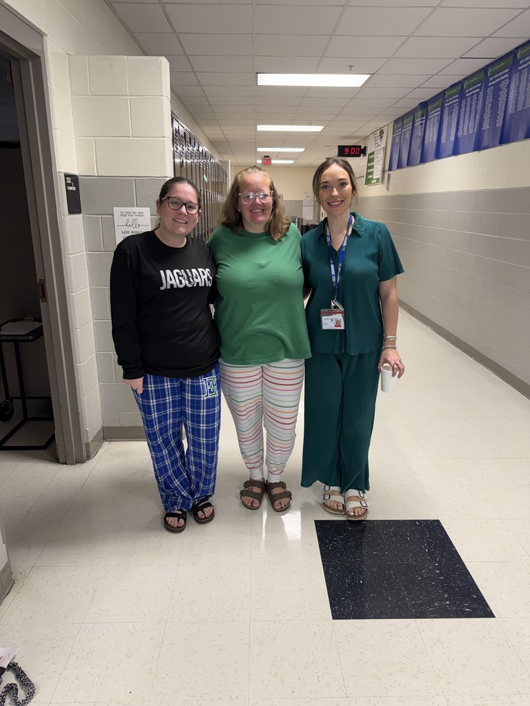 Mrs. Simpson, Mrs. Frith, and Ms. Godbey displaying the full spectrum of pajama styles.