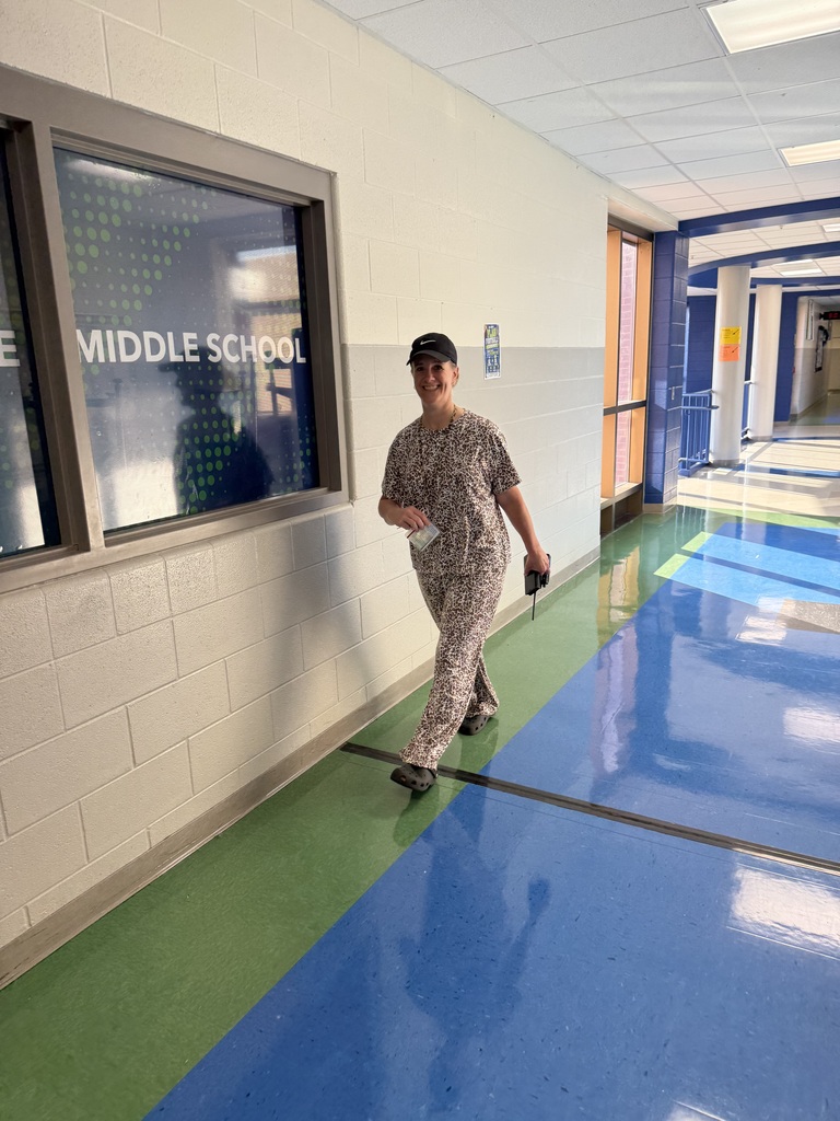Mrs. White bringing the Jaguar pride to PJ day!