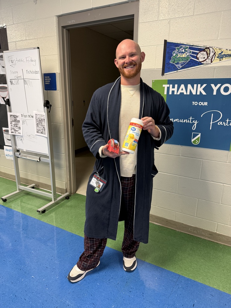 Mr. Hager in his robe and PJ's for spirit day.