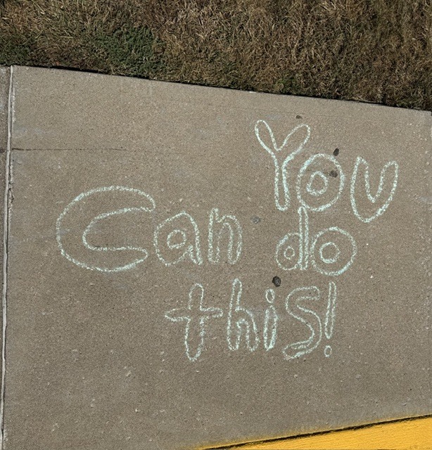 Messages of positive affirmation decorating the walkways of EJMS for 988 day.