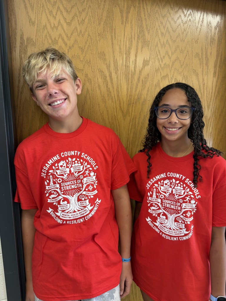 Sources of Strength Peer Leaders and community members kicking off Safe Schools Week, wearing red for mental health awareness.
