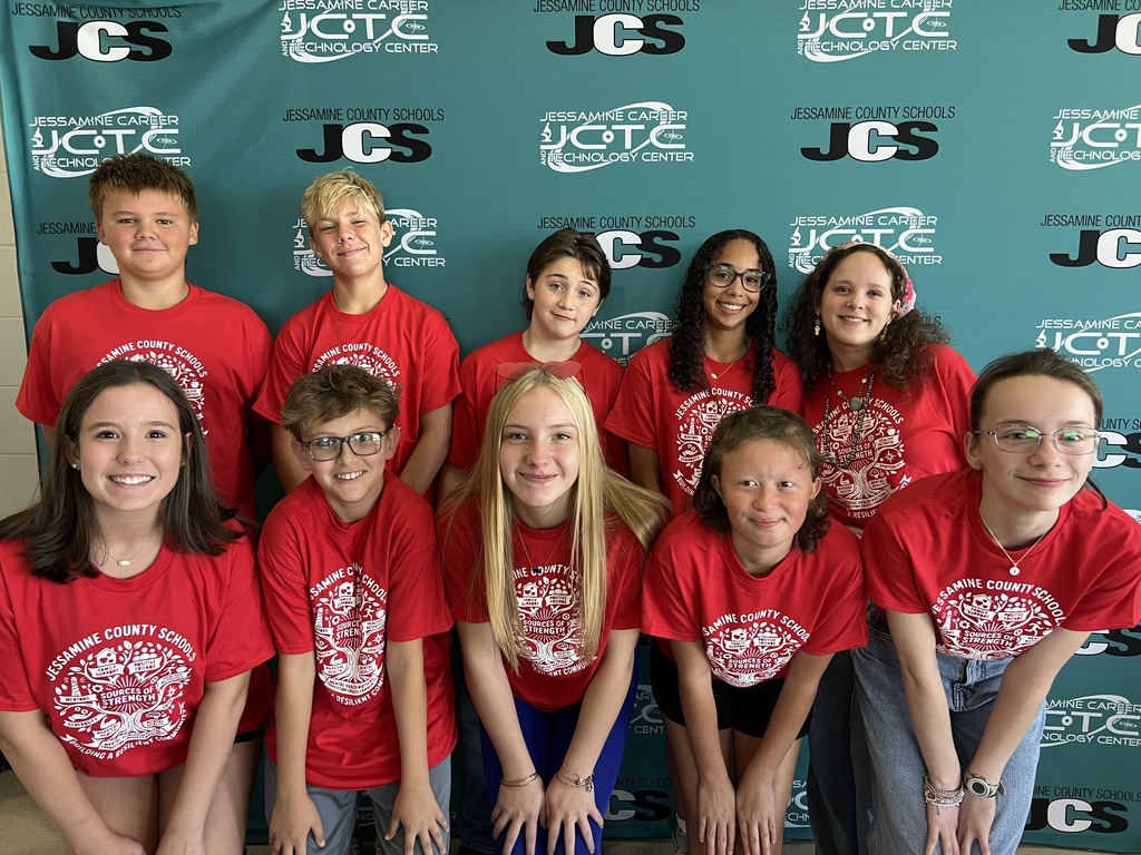 Sources of Strength Peer Leaders and community members kicking off Safe Schools Week, wearing red for mental health awareness.