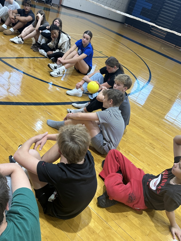 Students engaging in community circles.