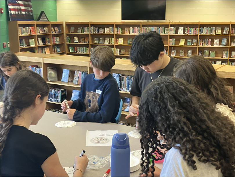 BETA Club members sharing the 4 pillars of BETA with peers interested in joining.