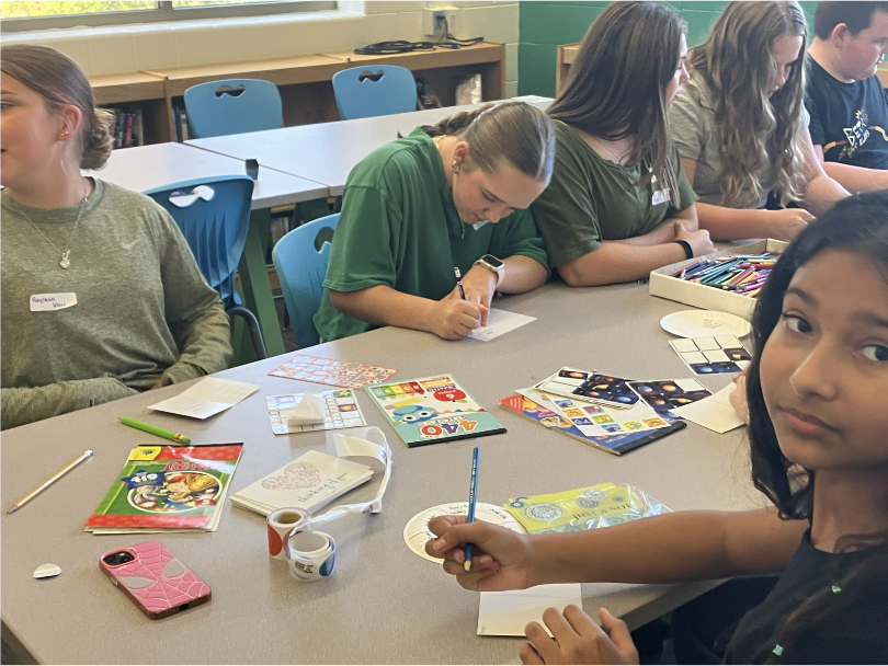 BETA Club members sharing the 4 pillars of BETA with peers interested in joining.
