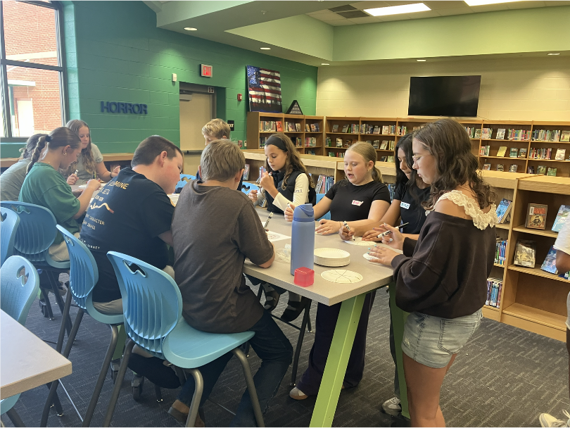 BETA Club members sharing the 4 pillars of BETA with peers interested in joining.