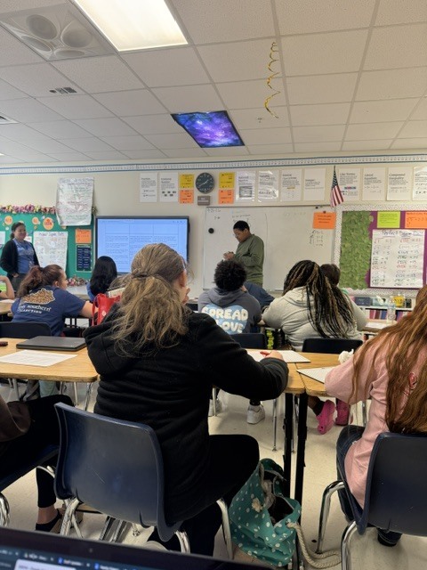 Jaiondre sharing his learning through leading Mrs. Jacobs' class, to help his peers better understand the concepts they are learning!