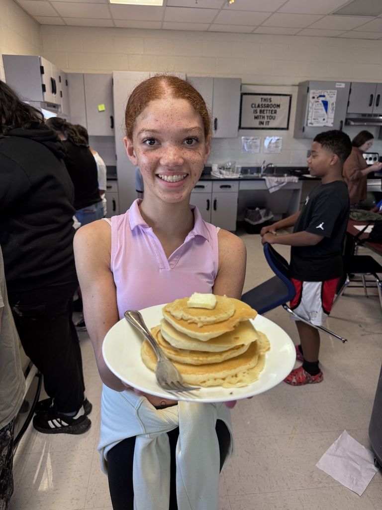 Mrs. Godbey's students whipping up some amazing pancakes for their cooking lab.