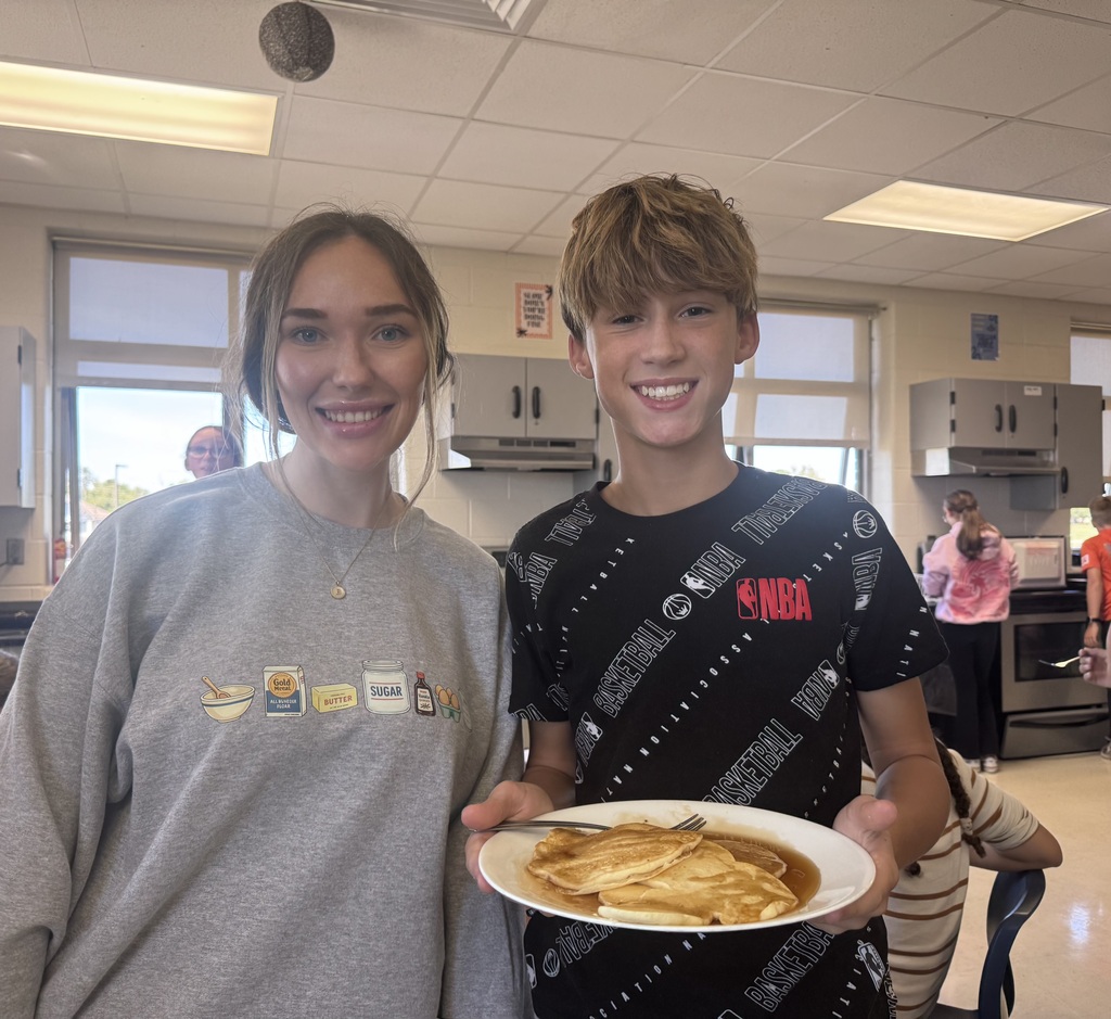 Mrs. Godbey's students whipping up some amazing pancakes for their cooking lab.