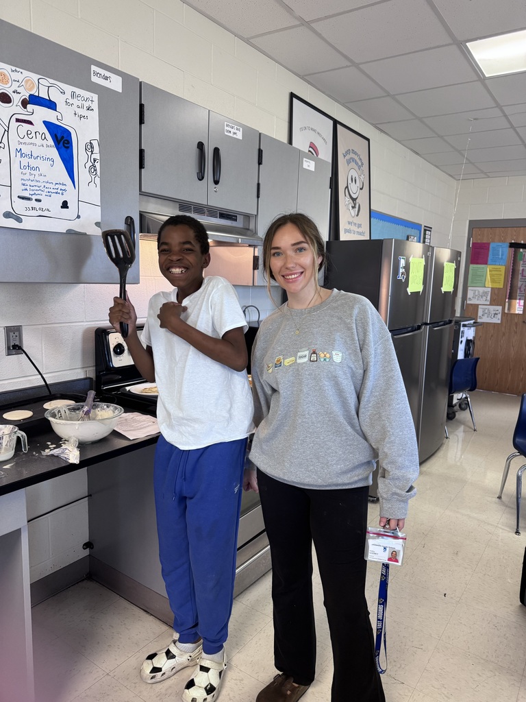 Mrs. Godbey's students whipping up some amazing pancakes for their cooking lab.
