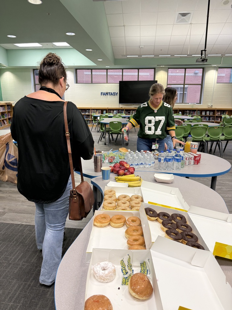 EJMS staff enjoying breakfast provided by our PTO.
