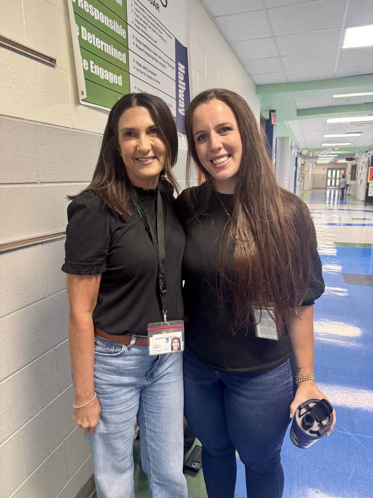 EJMS staff wearing matching outfits.