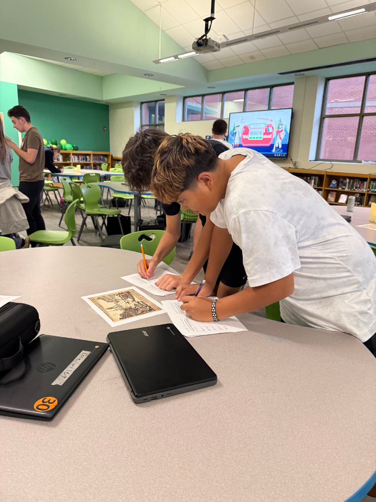 Mrs. Simpson, Mr. Warren, and Mr. Paulus' 8th grade classes teaming up to solve mysteries surrounding the Boston Massacre.