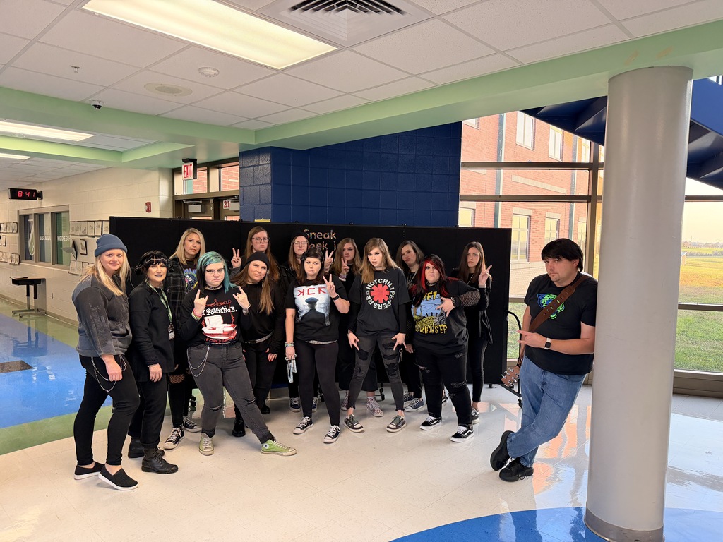 EJMS students and staff celebrating spooky season with fun costumes!