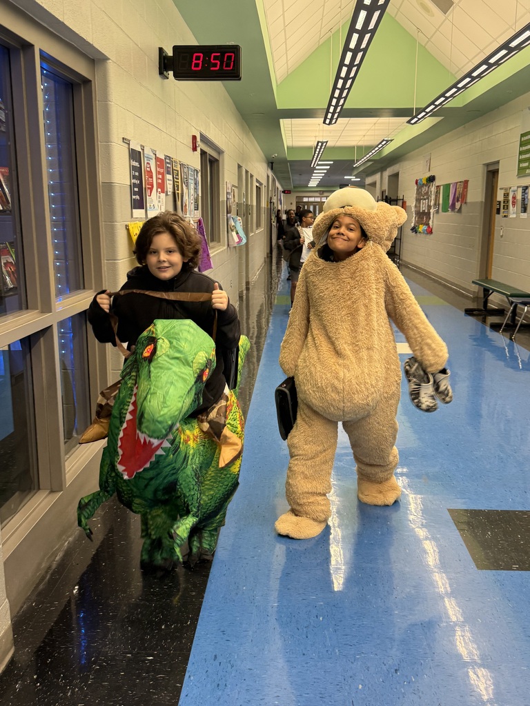 EJMS students and staff celebrating spooky season with fun costumes!