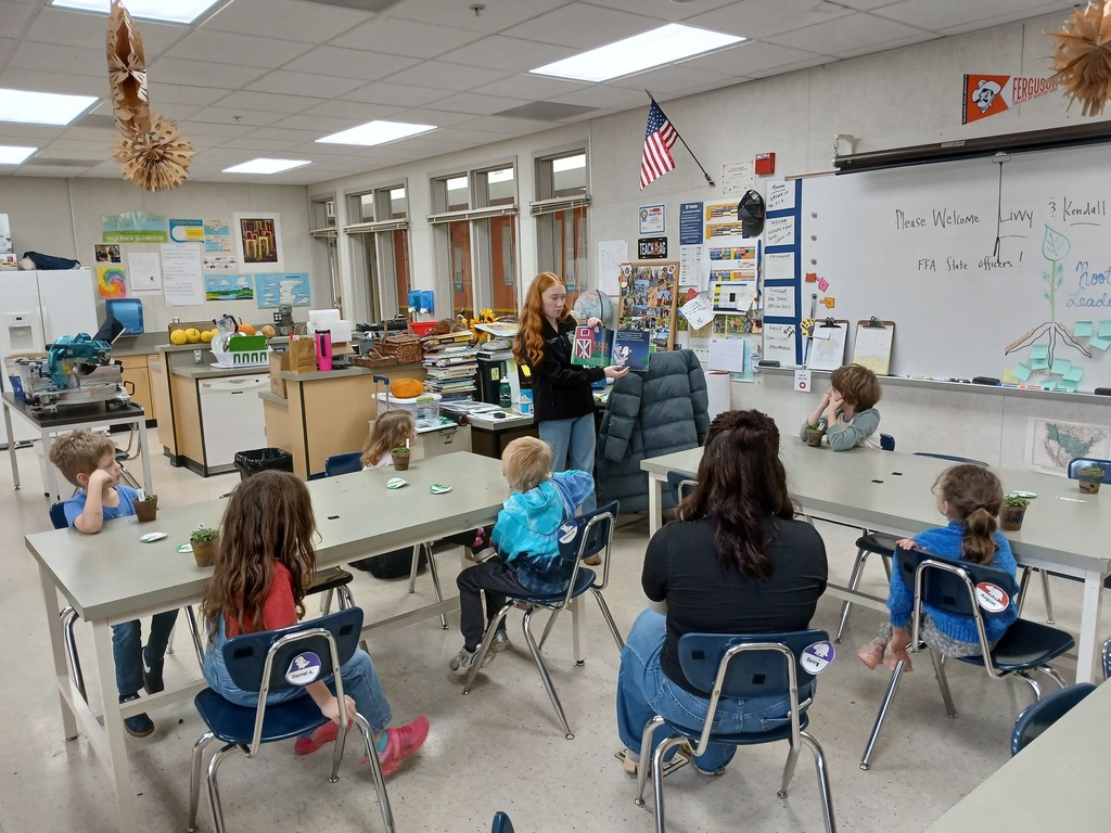 FFA State Officers Livvy Sturm and Kendall Holcomb reading to Kindergarten