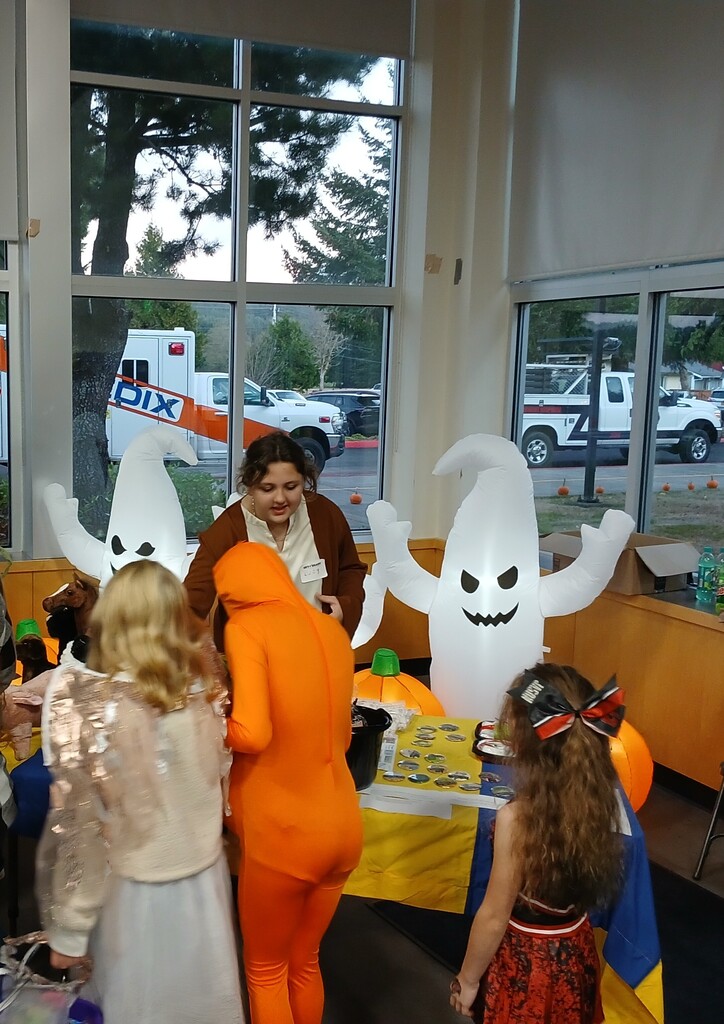 Student led FFA booth with elementary students 'trick-or-treating'
