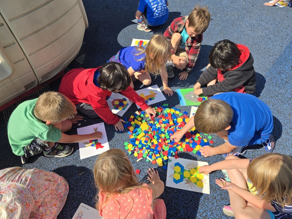 First Graders making Math Patterns