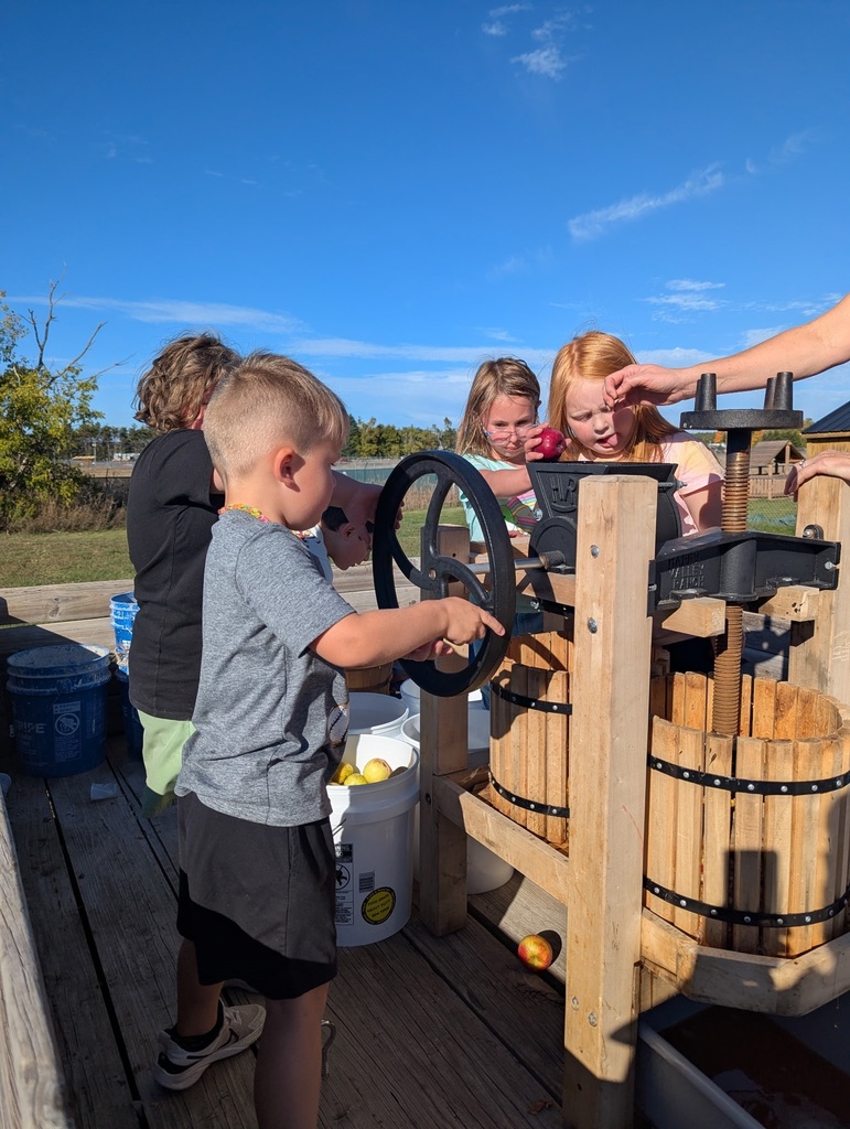 Cranking the cider press